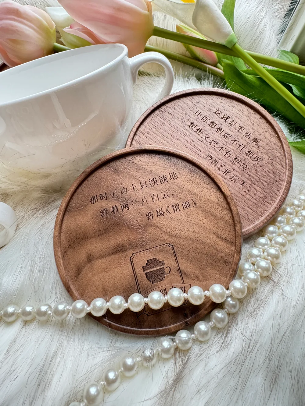 Customised wooden coasters and a cup used as physical touchpoints.